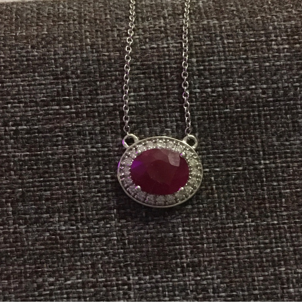Heera Moti- oval cut ruby and round diamonds necklace.